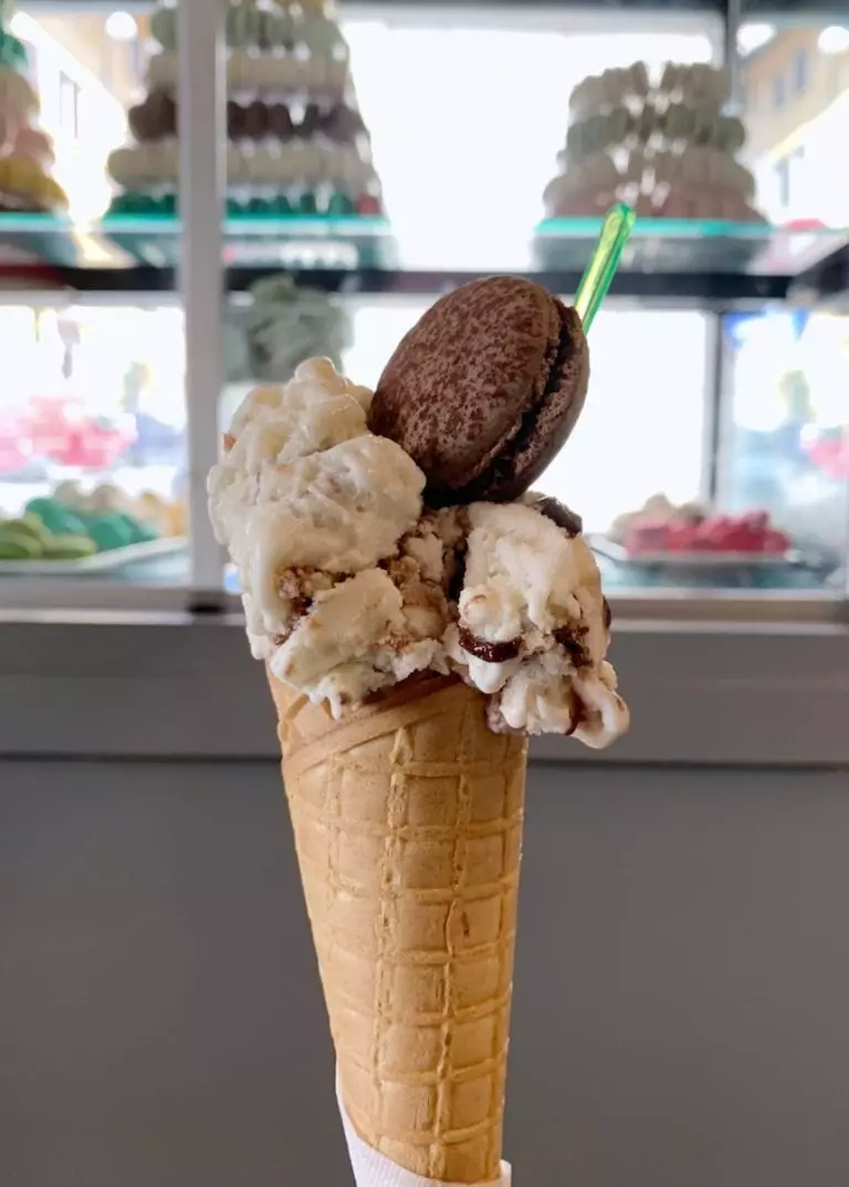 Ice cream scoops in a waffle cone.